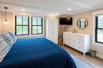Master bedroom with King bed dresser, closet and 40 flatscreen TV